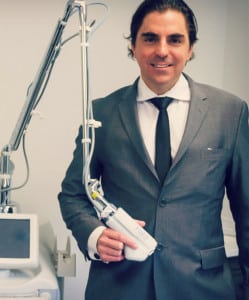 Dr John Antonetti holding laser