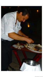 Milos Antonios serving