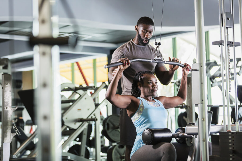 Work with a personal trainer to acheve your fitness resolutions