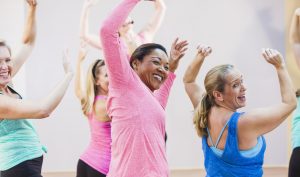 Group of multi-ethnic women in exercise class