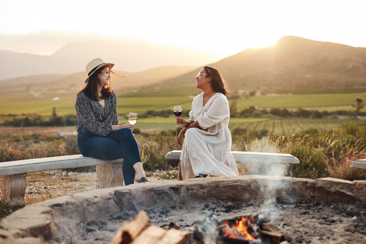 Women drinking wine on the patio