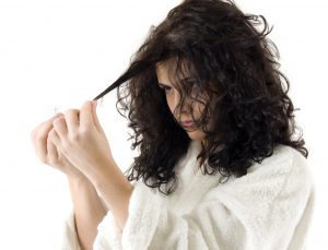 hair loss - dark haired woman