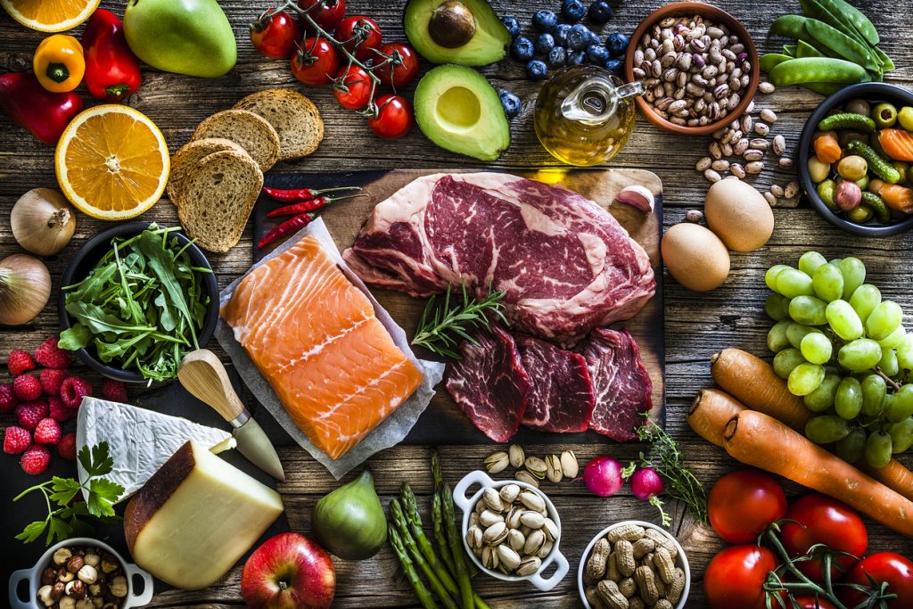 protein sources example includes fish, red meat, fruits, vegetables, and legumes.