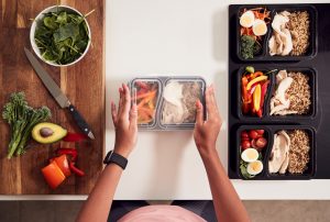 Woman packing a protein-packed lunch