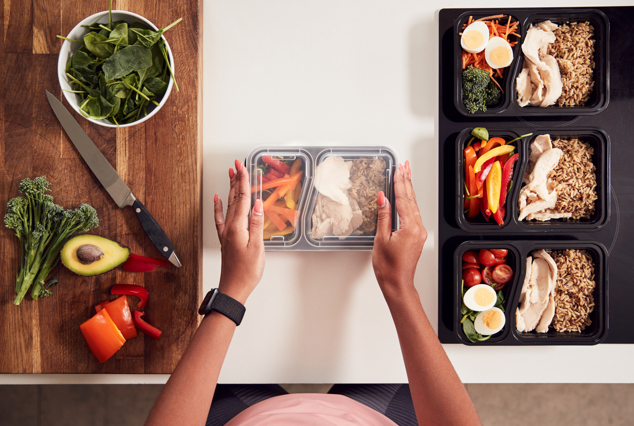 Woman packing a protein-packed lunch