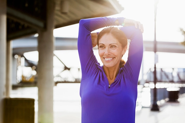 Woman stretching outside