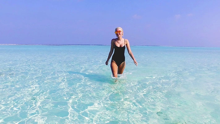 swim season: lady in the ocean
