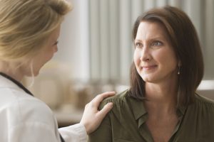Woman Talking with Doctor
