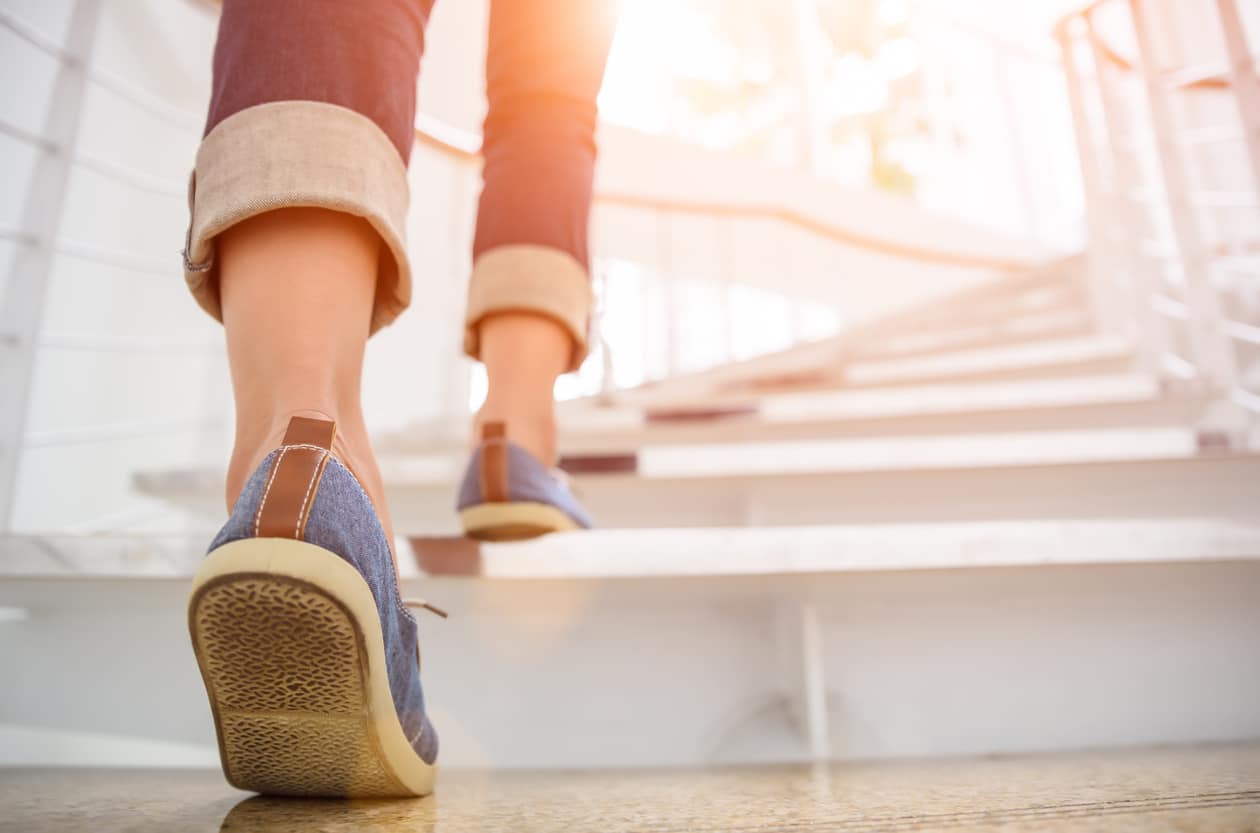 Woman Climbing Stairs