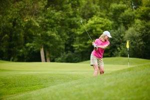 Woman Playing Golf