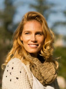 Fall hair trends - woman with lovely hair wearing a scarf