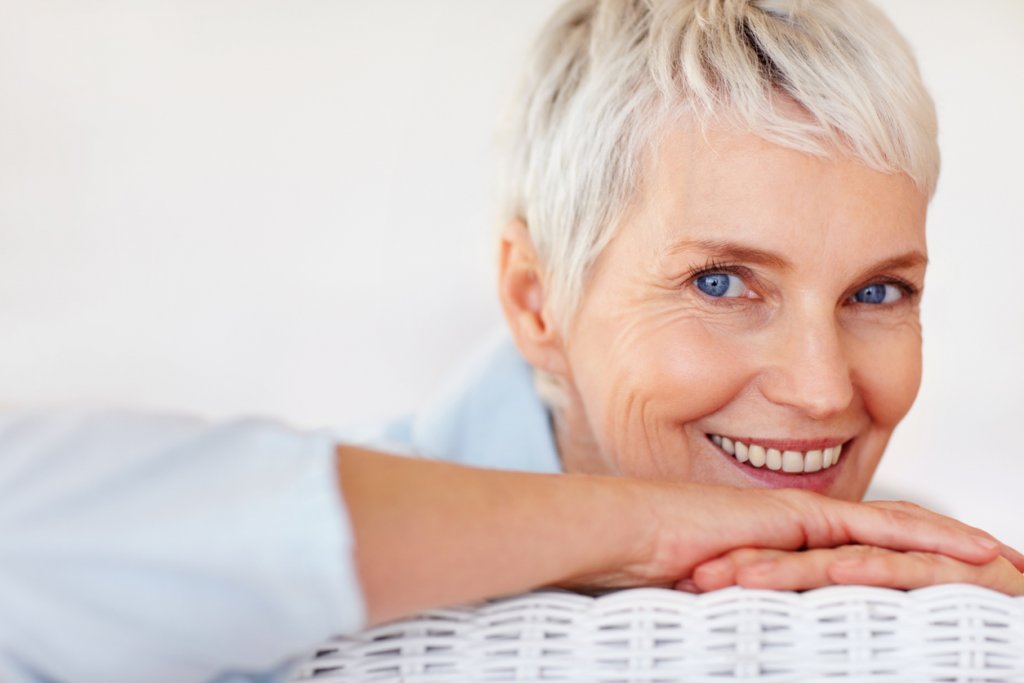 Happy senior woman posing