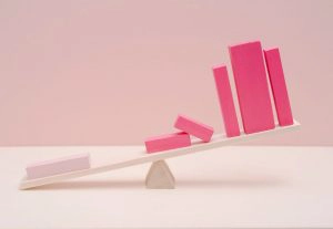 pink blocks on a seesaw
