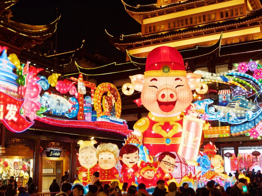 Lantern Festival in the Chinese New Year( Pig year), night view of colorful lanterns and crowded people walking in Yuyuan Garden.