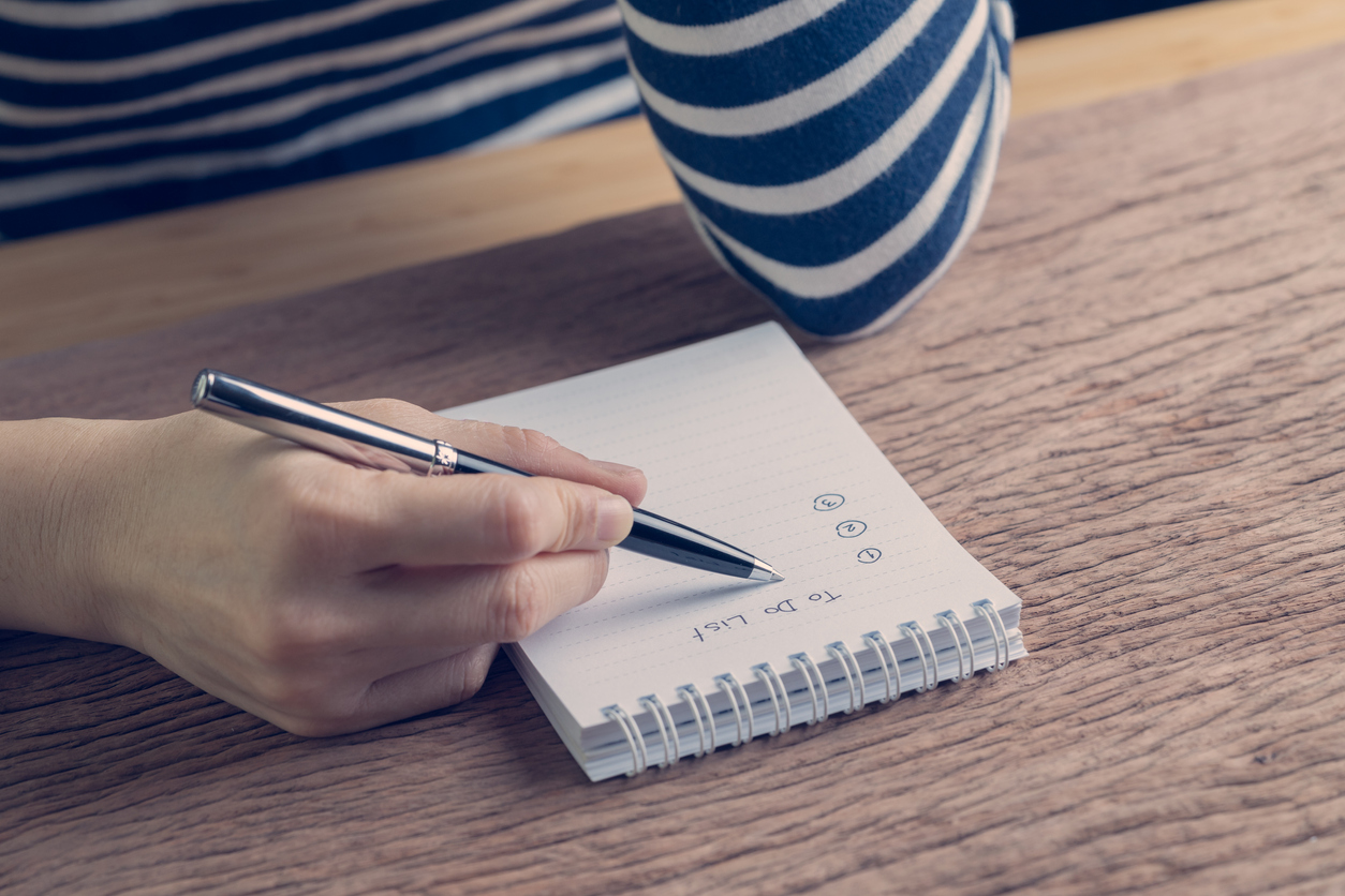 Woman Making To-Do List