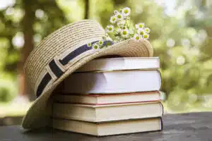 Sandy's April Reading List Books with Easter Hat