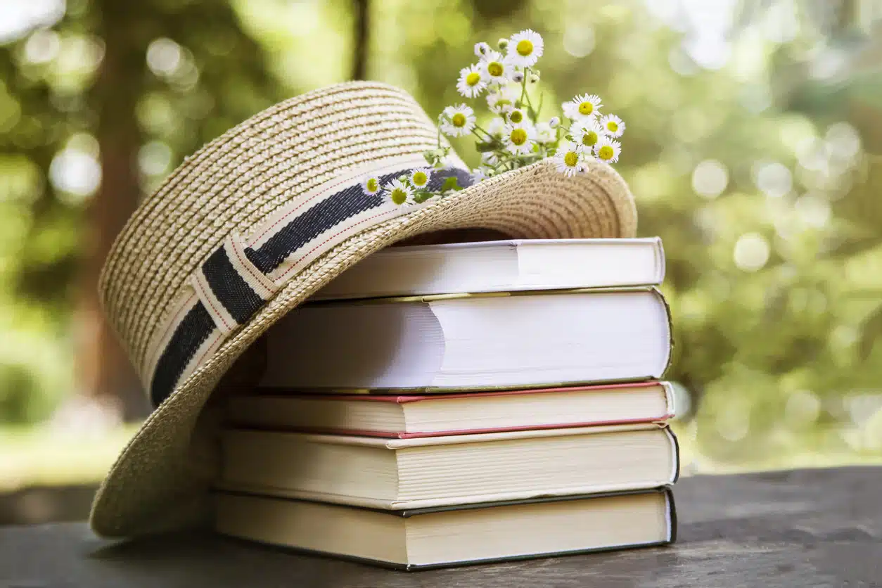 Sandy's April Reading List Books with Easter Hat