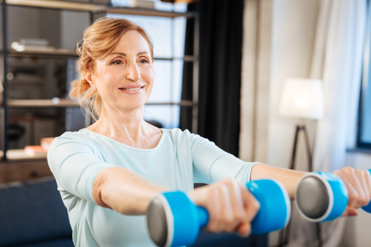 Mature Woman Using Weights
