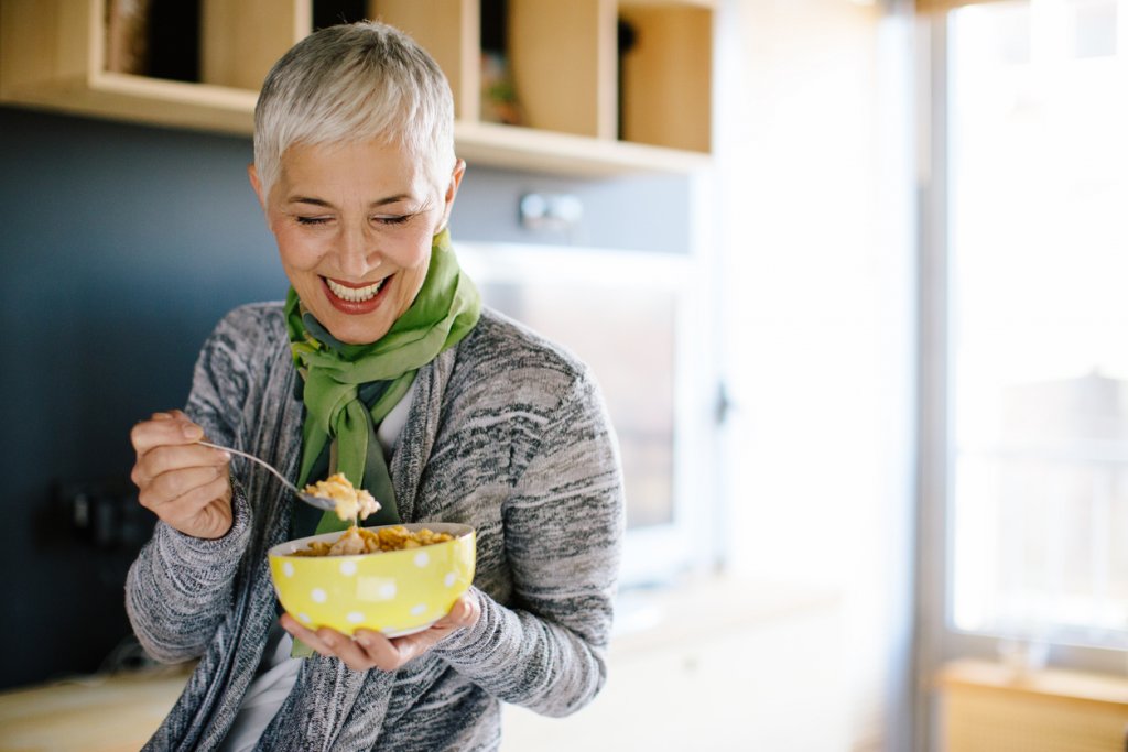 Woman Eating a Healthy Breakfast