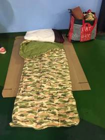 sleeping on cardboard like homeless people