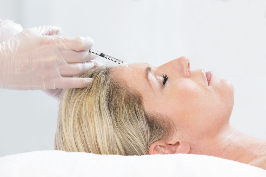 Woman Receiving Botox Injections