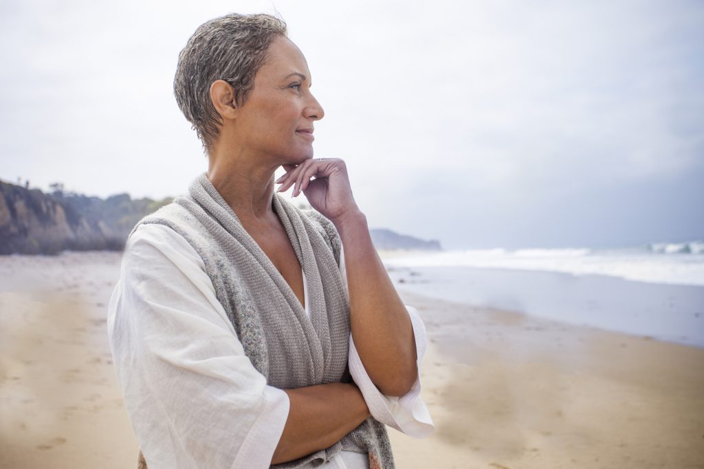 women inspiring women Senior Black Woman Relaxing on Beach