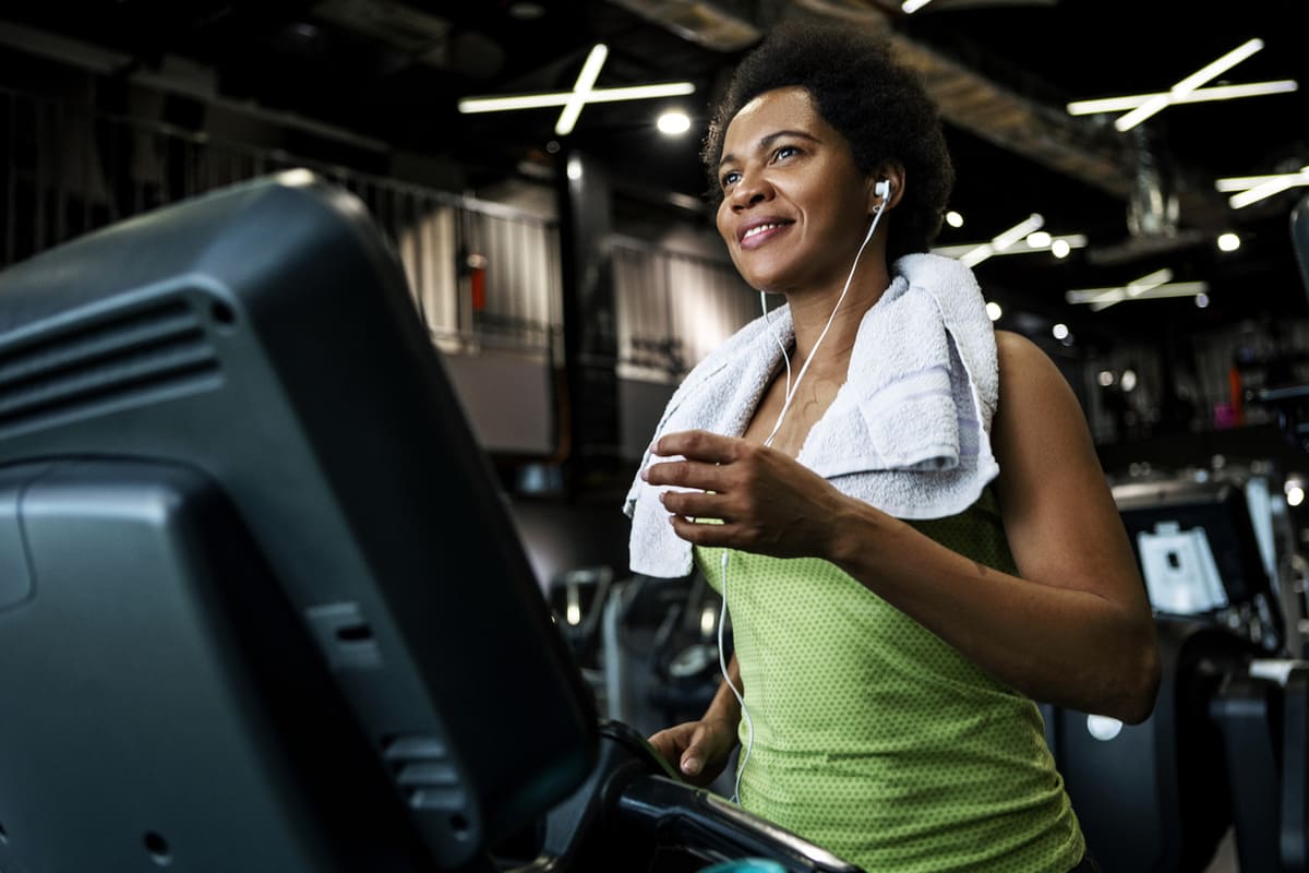 woman exercising at the gym on a treadmill