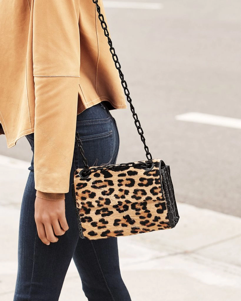 Nancy Gonzalez Madison Small Leopard Flap Shoulder Bag adds animal prints to your fall wardrobe