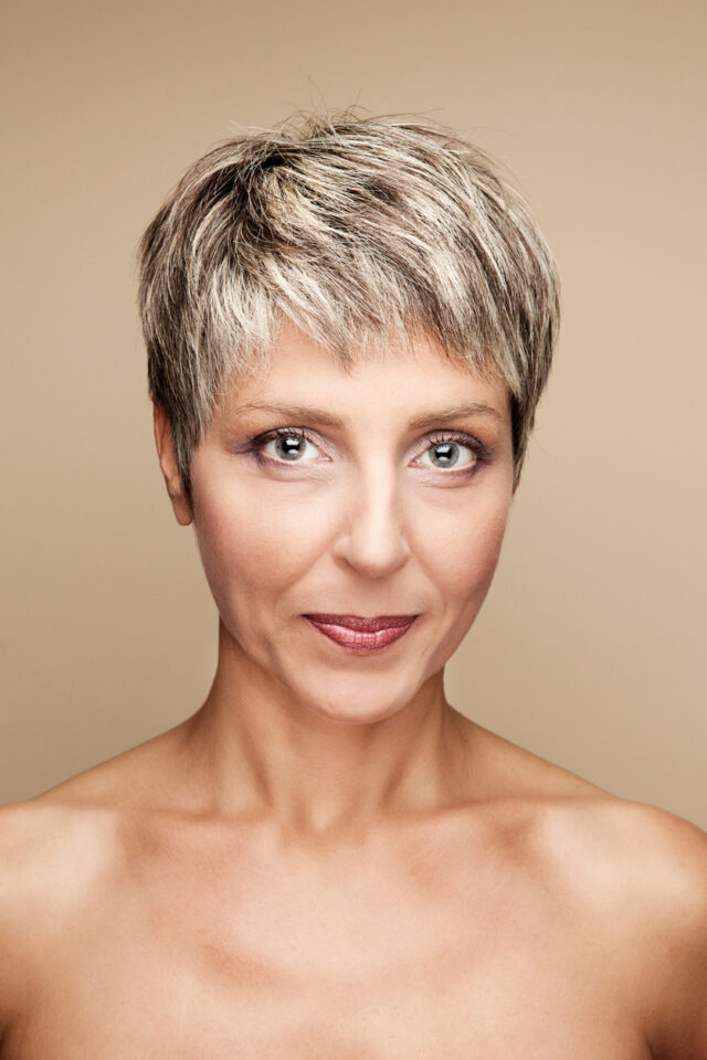 Woman with a pixie haircut to help hide thinning hair