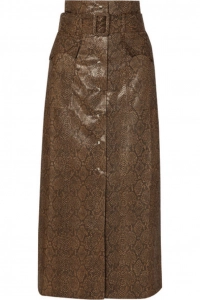 A belted skirt offers a tailored approach to wearing leather.