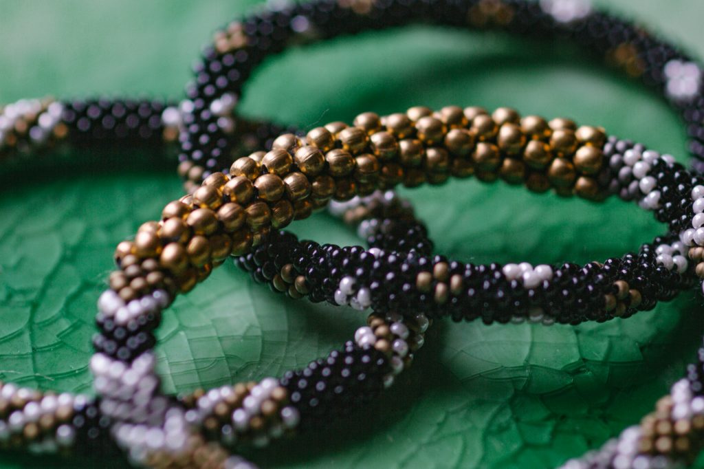 Aid Though Trade Bracelet closeup