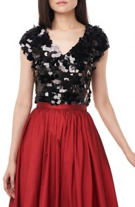 this sweet large sequin top doesn't show too much skin