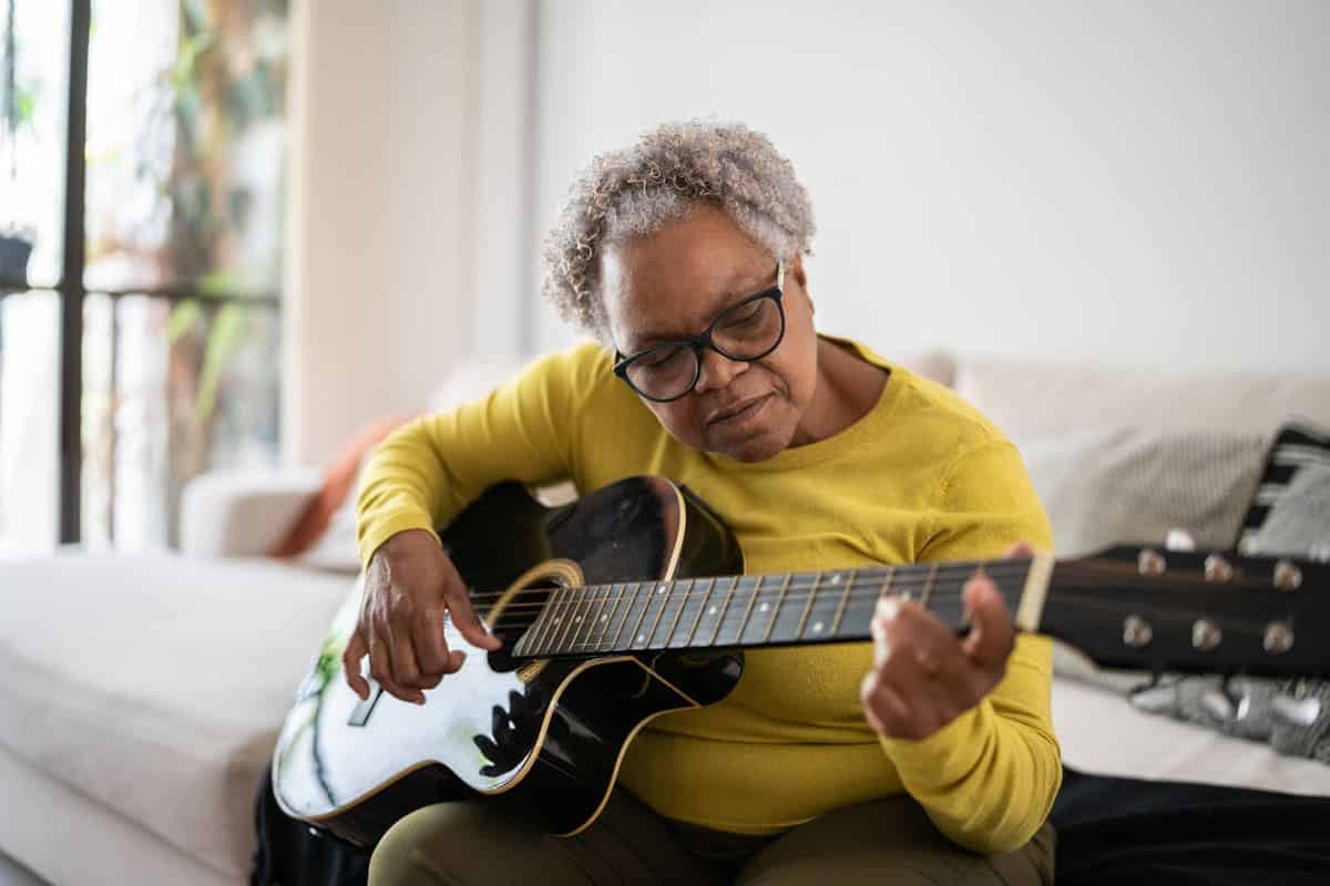 Woman learning instrument