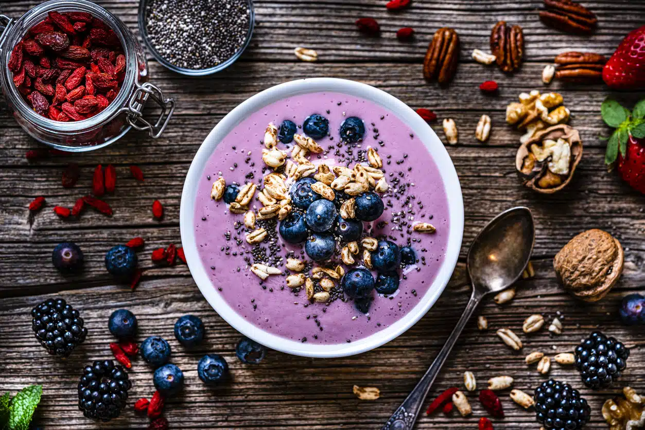 Blueberry smoothie with chia seeds, nuts, blackberries, healthy and nutritious 