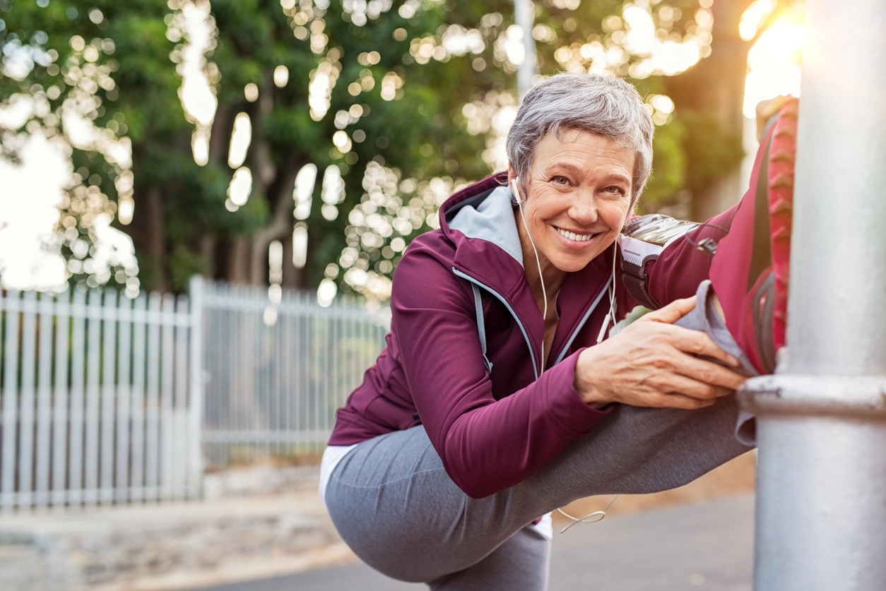 Woman warming up with stretches