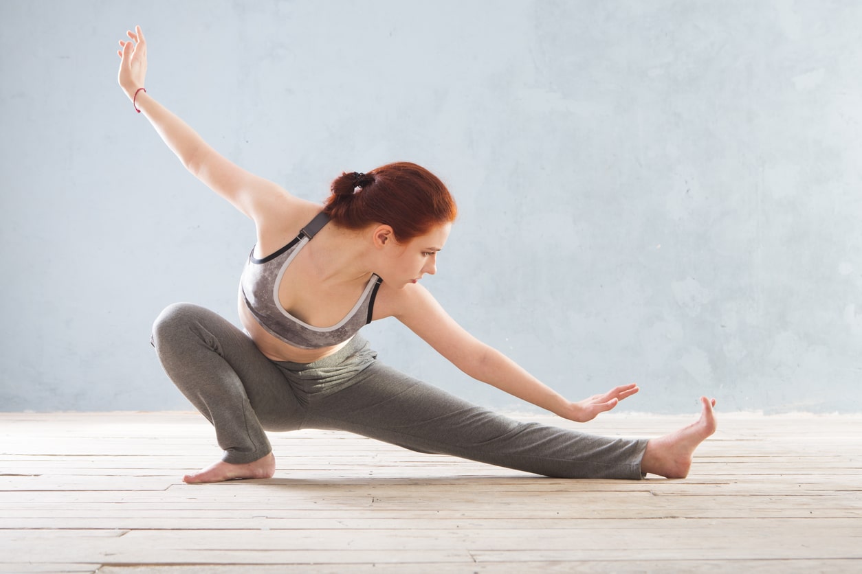 Woman practicing tai chi building flexibility