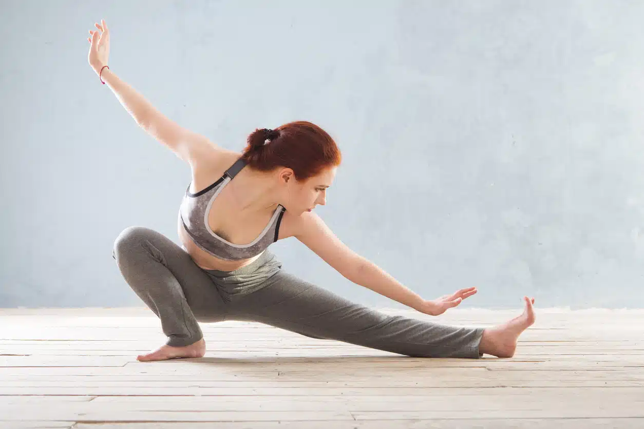 Woman practicing tai chi building flexibility 