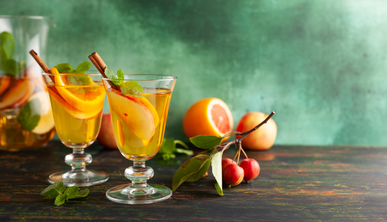 Autumn Sangria cocktail recipe with apples and cinnamon sticks