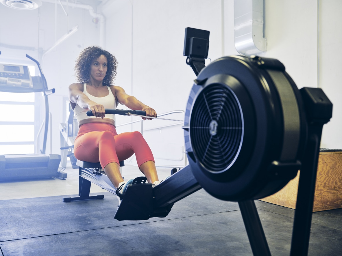 Woman on a rowing machine, workout