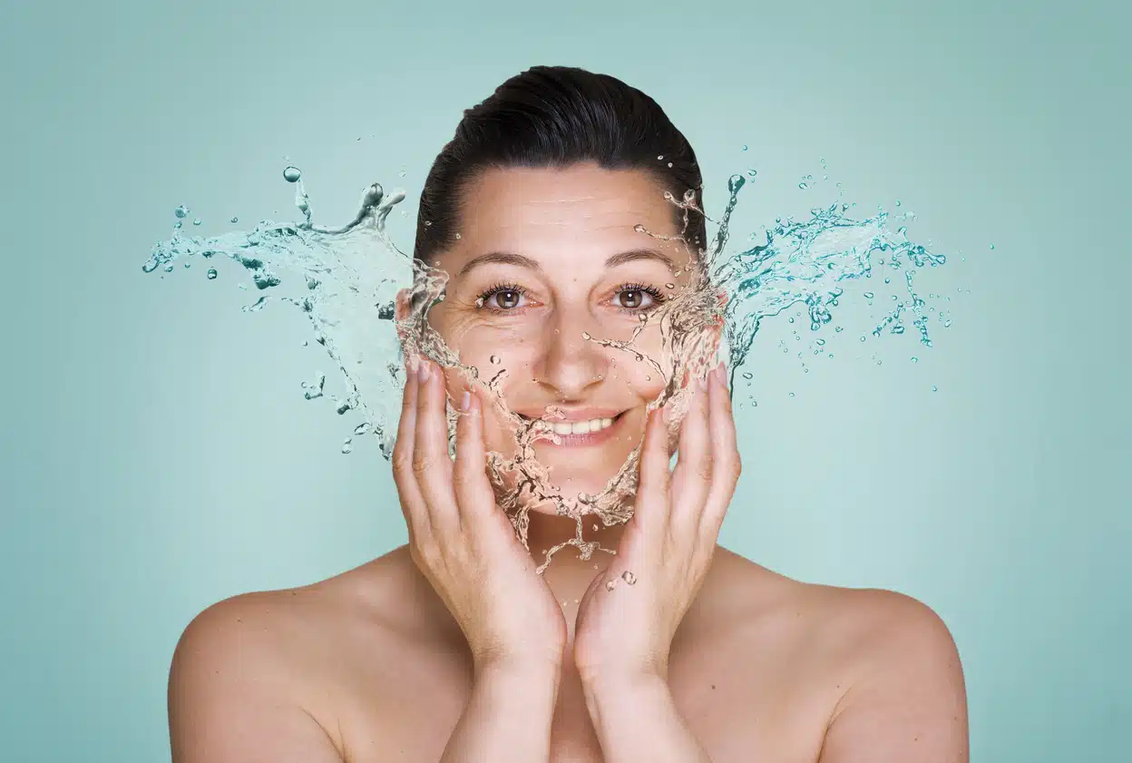Woman washing face