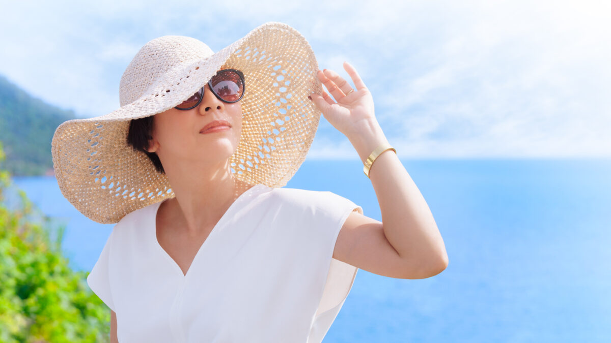 woman in a sunhat a the beach