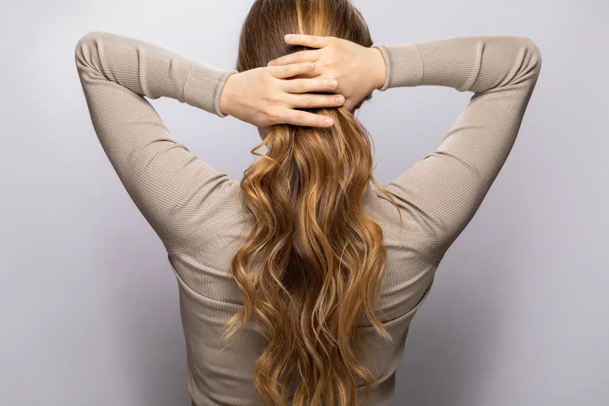 Woman with long wavy healthy hair