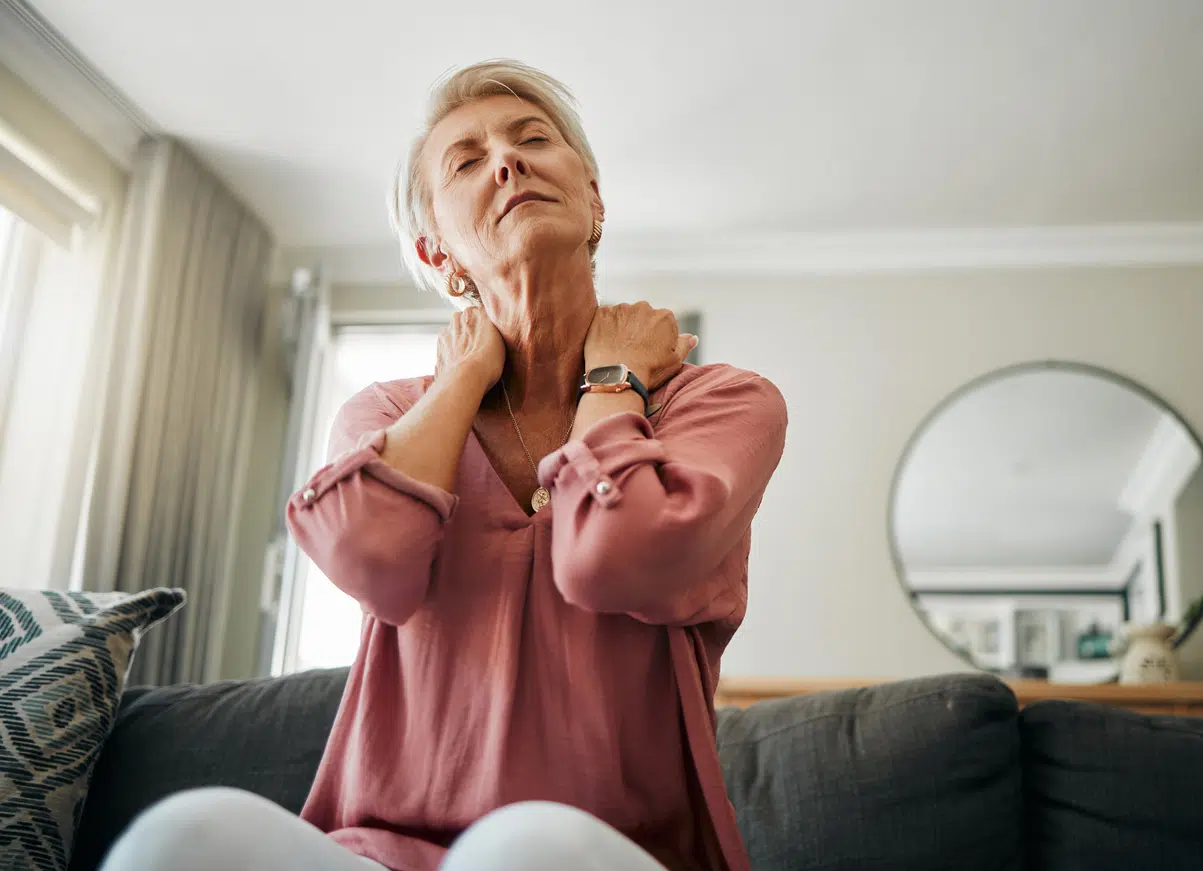 Woman with back or neck pain or osteoporosis