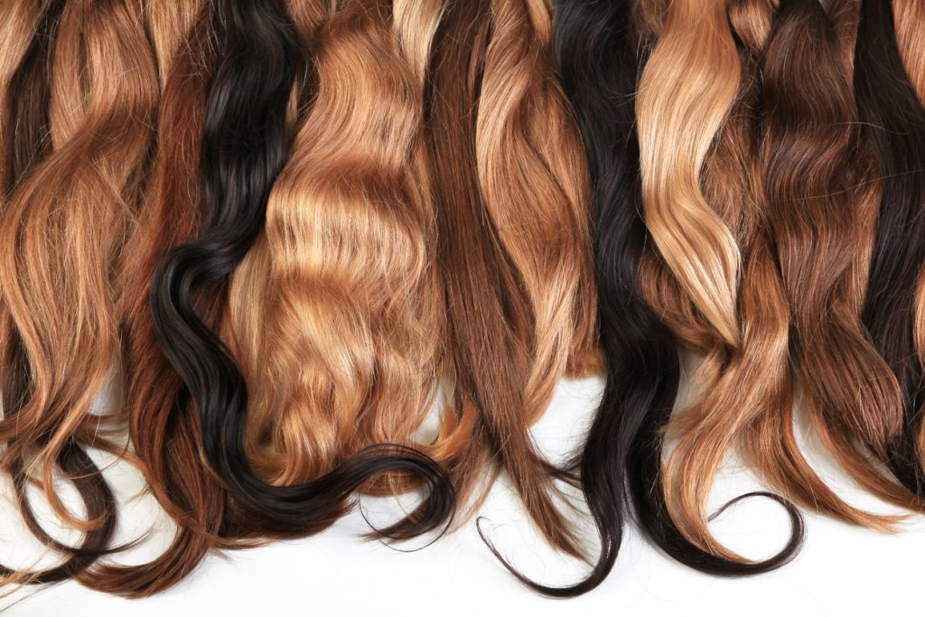 Hair extensions come in a variety of colors, lengths, and styles.