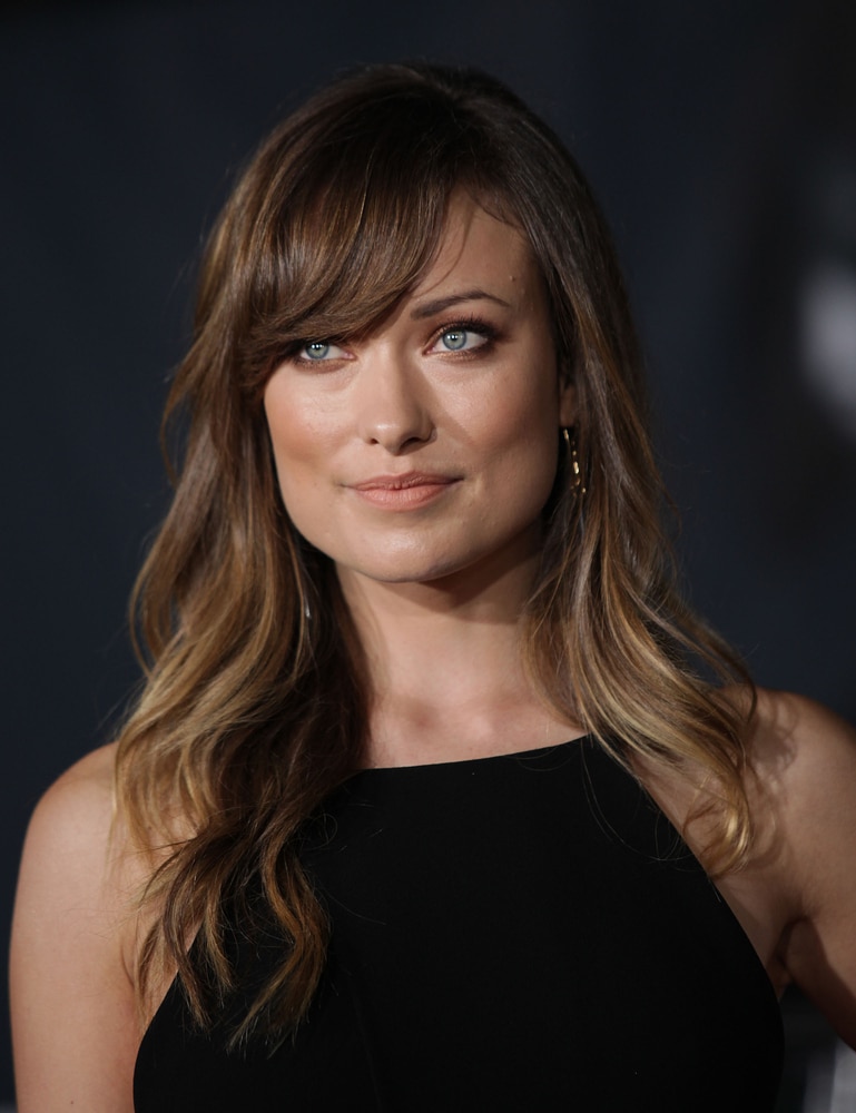 Olivia Wilde Medium Length Wavy Hair with sideswept bangs