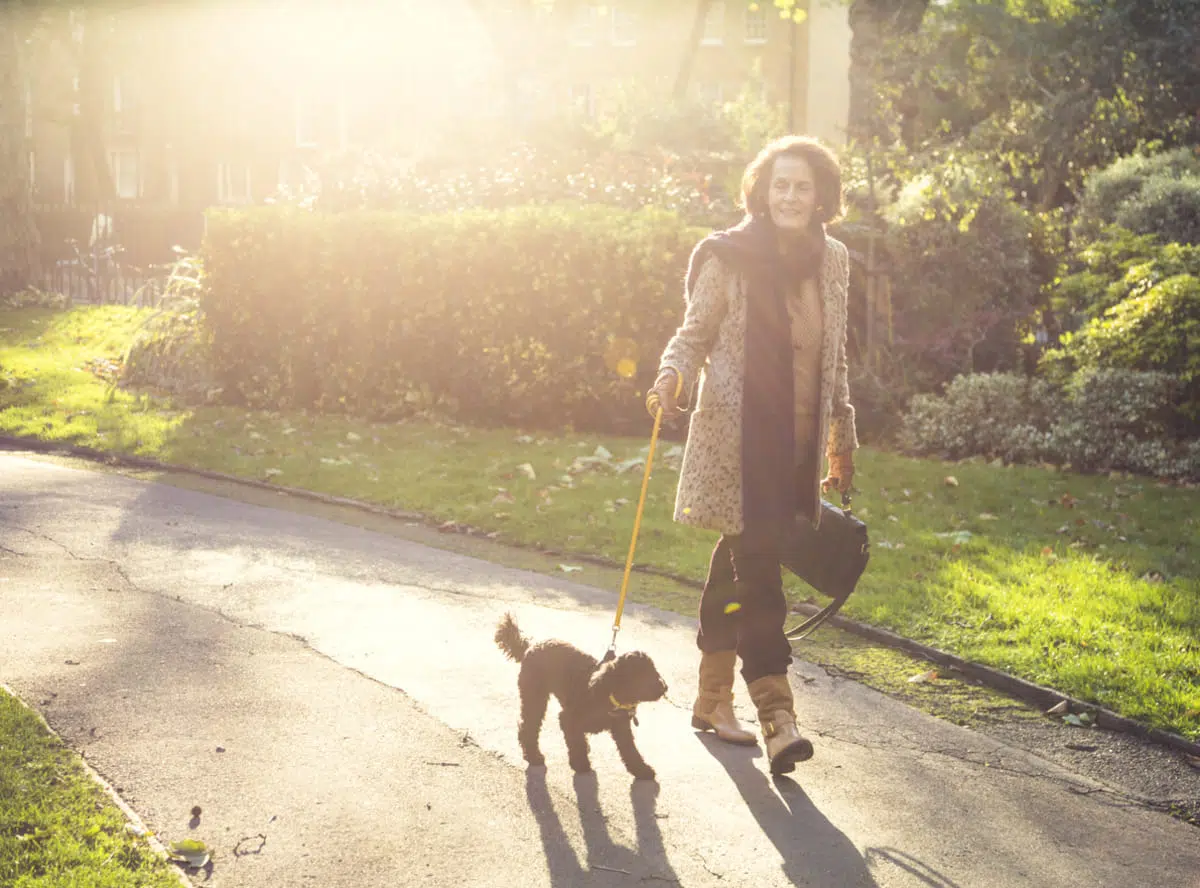 Woman walking her dog