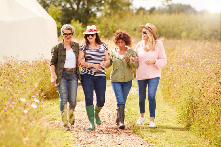 Fun things to do with friends over 50 - out for a walk at a campsite