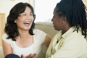 Women talking about investing in precious metals