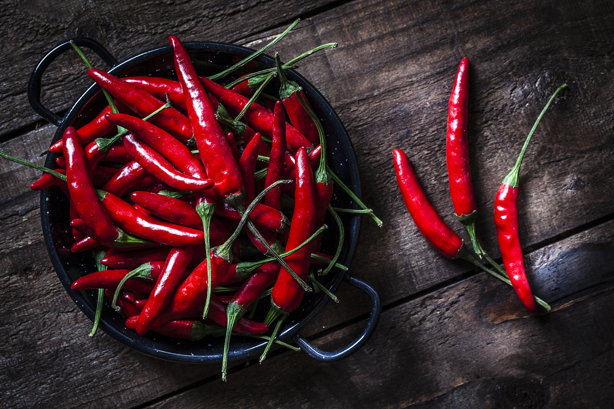 Spicy food, like the chili peppers shown, can help clear your sinuses