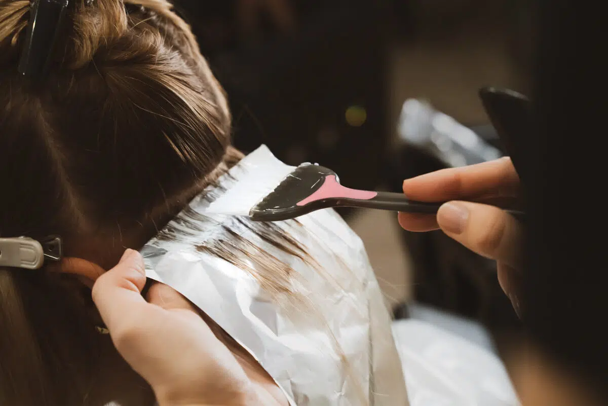 woman getting her hair colored